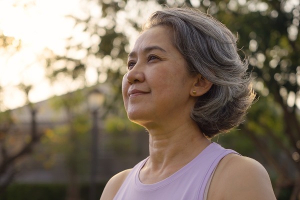 Woman looking to the horizon smiling