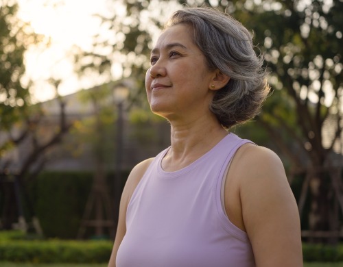 Woman looking to the horizon smiling 2