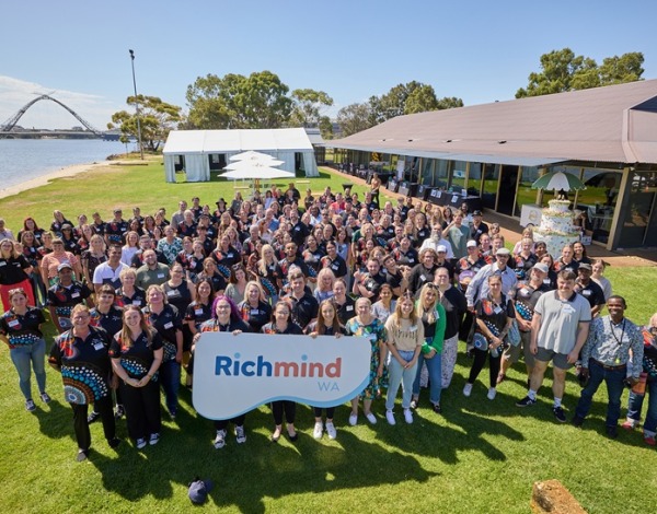 Richmind WA staff 100+ people outside holding a Richmind WA sign
